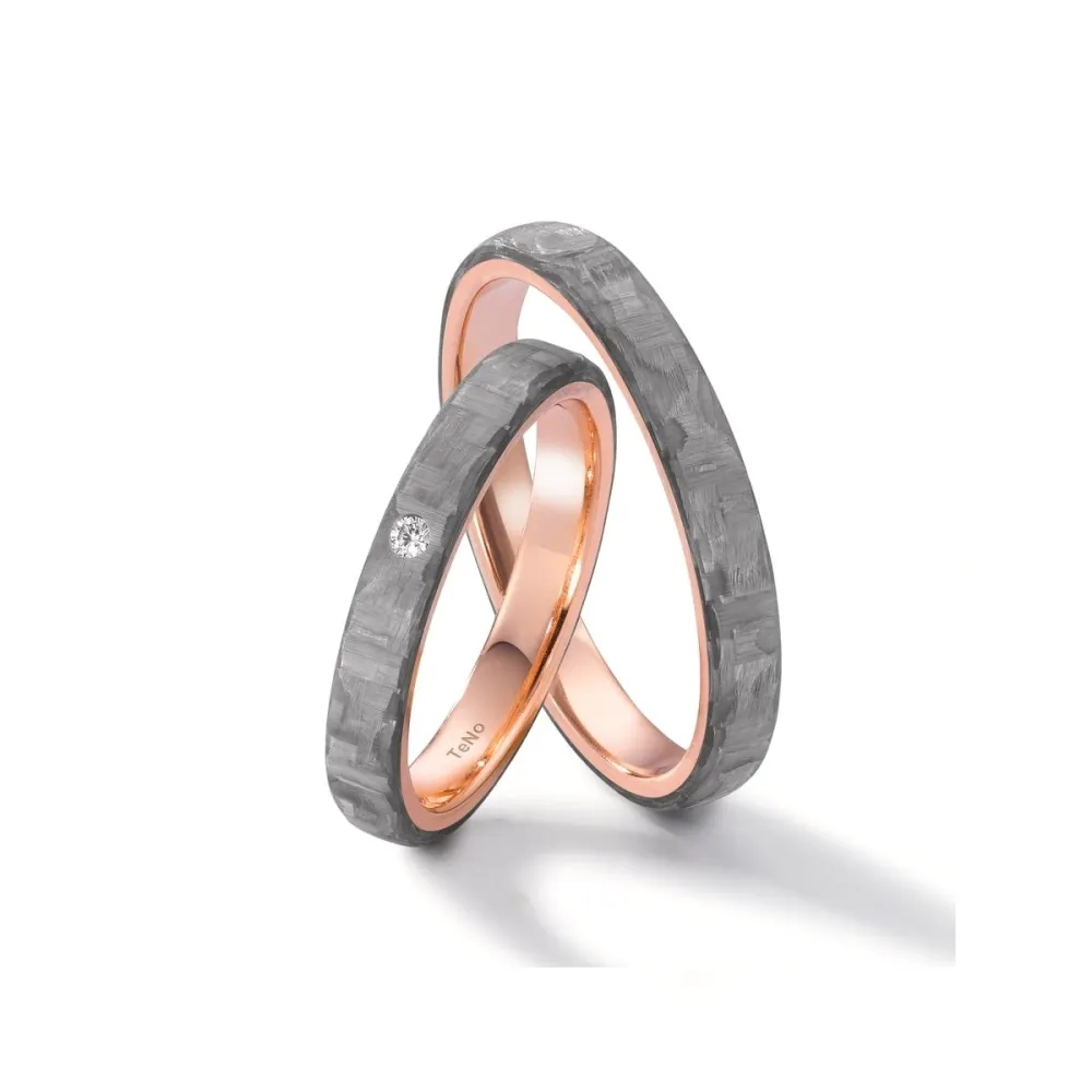 Alianzas de boda de carbono y oro rosado con diamante