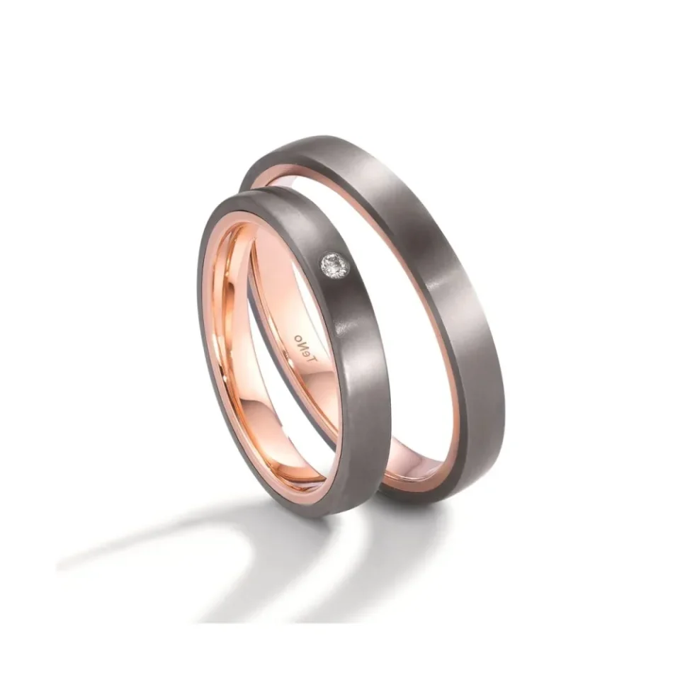 Alianzas de boda de tántalo y oro rosado con diamante