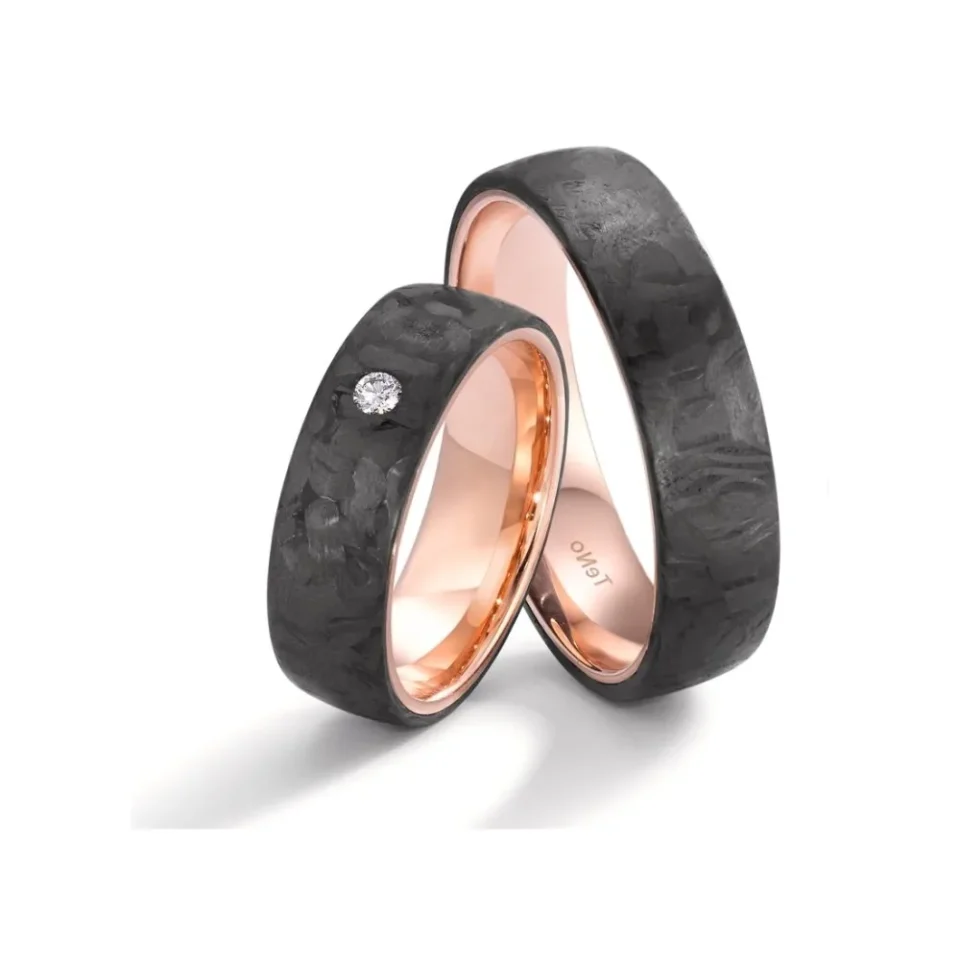 Alianzas de boda de carbono y oro rosado con diamante