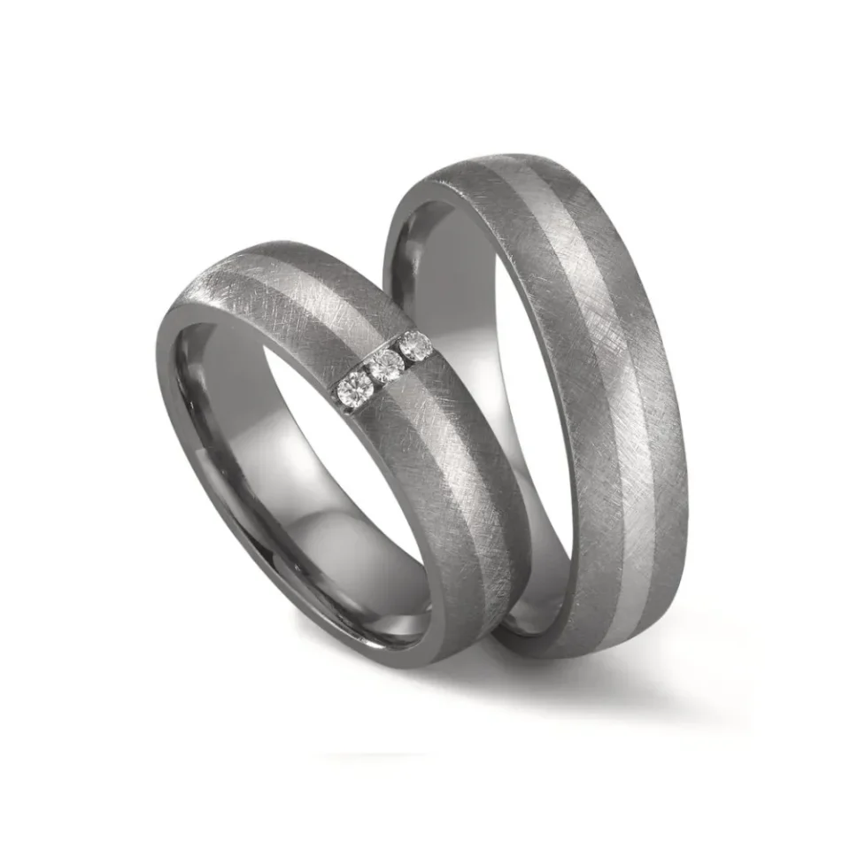 Alianzas de boda de tántalo y platino con diamantes