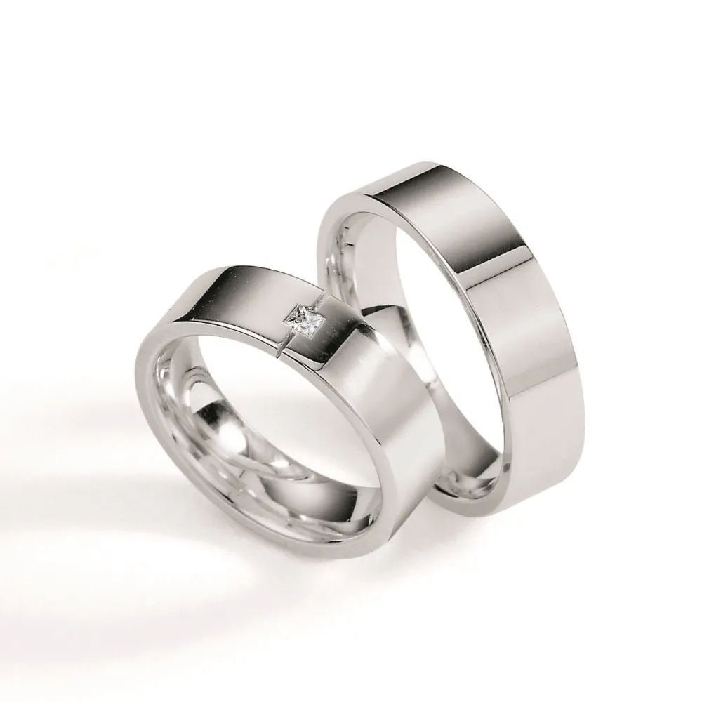 Alianzas de boda de plata con diamante