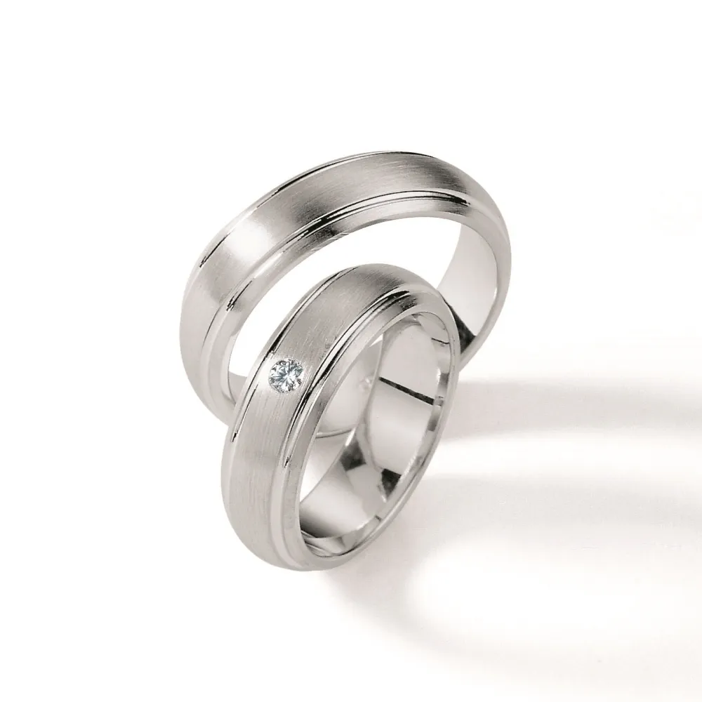 Alianzas de boda de plata con diamante