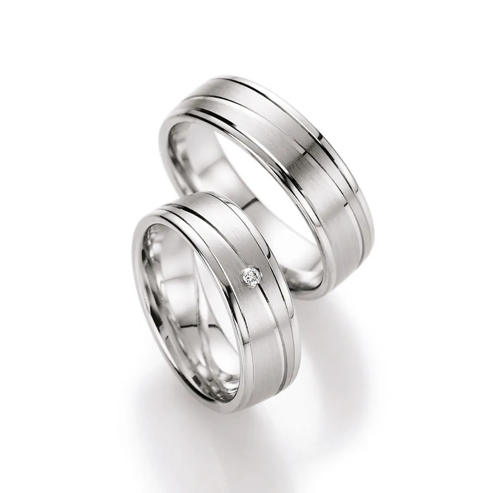 Alianzas de boda de plata con diamante