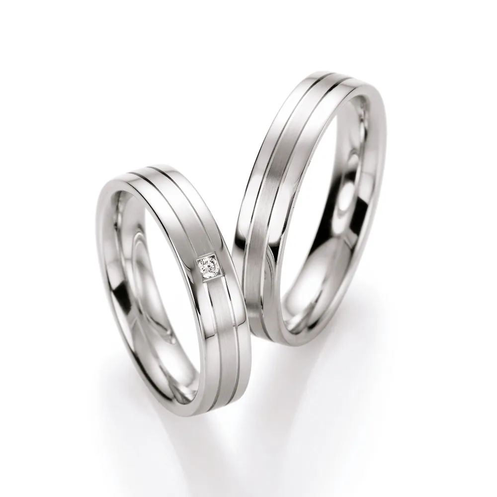 Alianzas de boda de plata con diamante