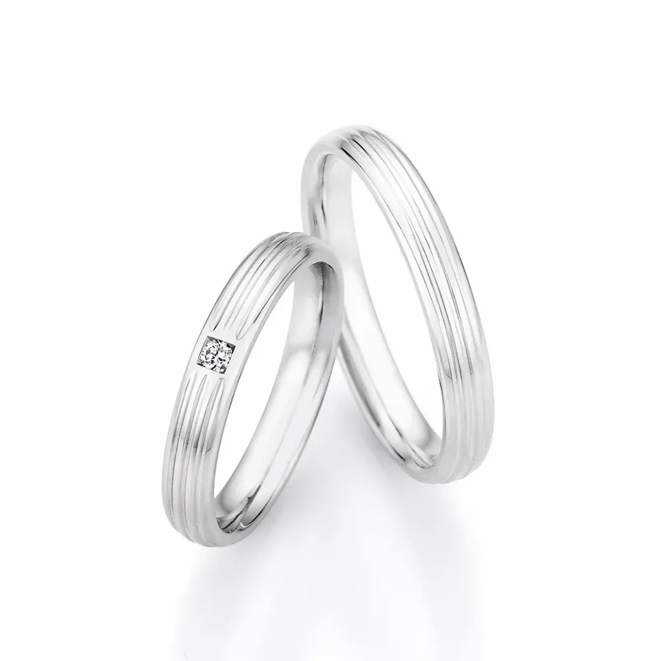 Alianzas de boda de plata con diamante