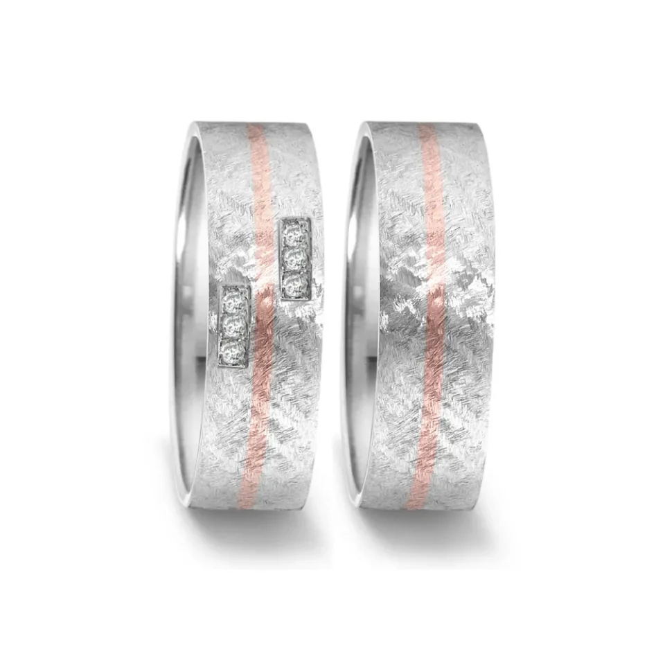 Alianzas de boda de acero y oro rosado con diamantes