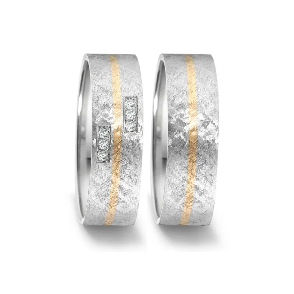Alianzas de boda de acero y oro amarillo con diamantes