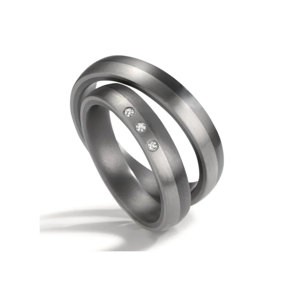Alianzas de boda de tántalo y platino con diamantes