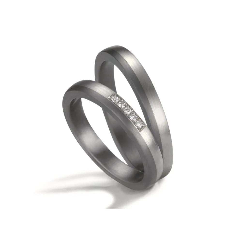 Alianzas de boda de tántalo y platino con diamantes