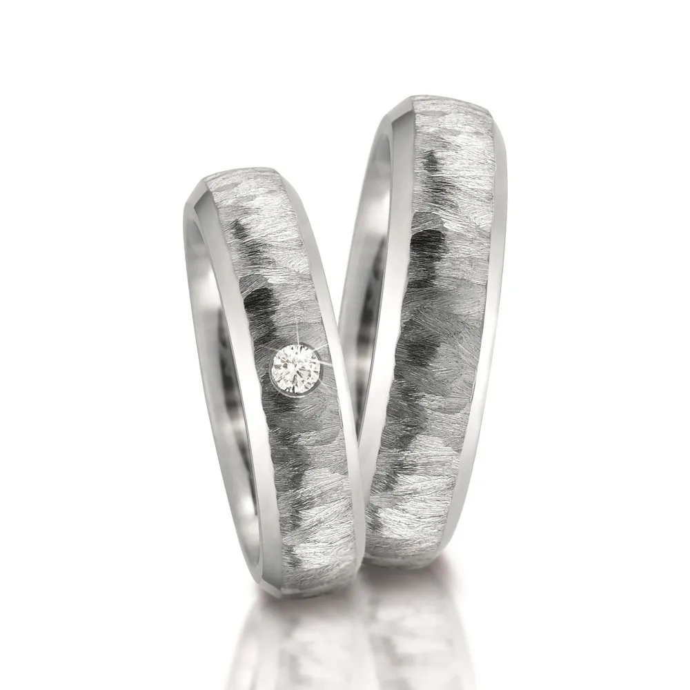 Alianzas de boda de acero con diamante