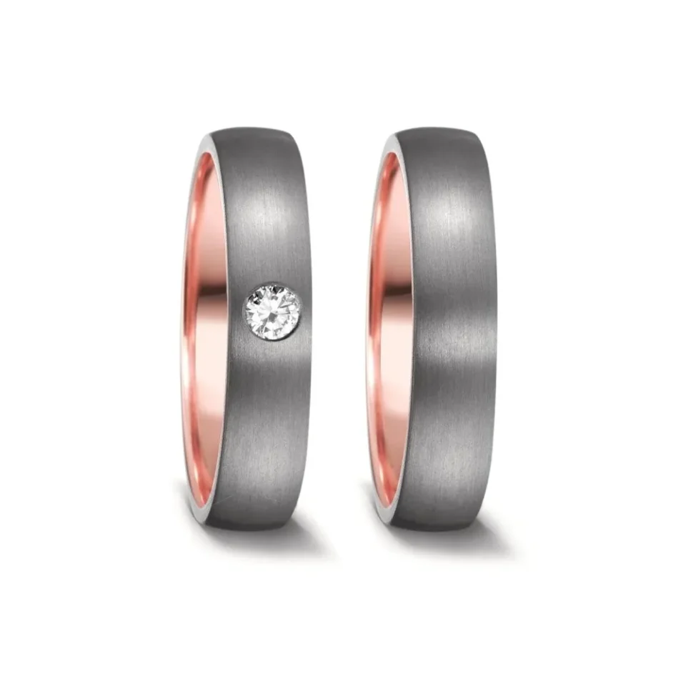 Alianzas de boda de tántalo y oro rosado con diamante