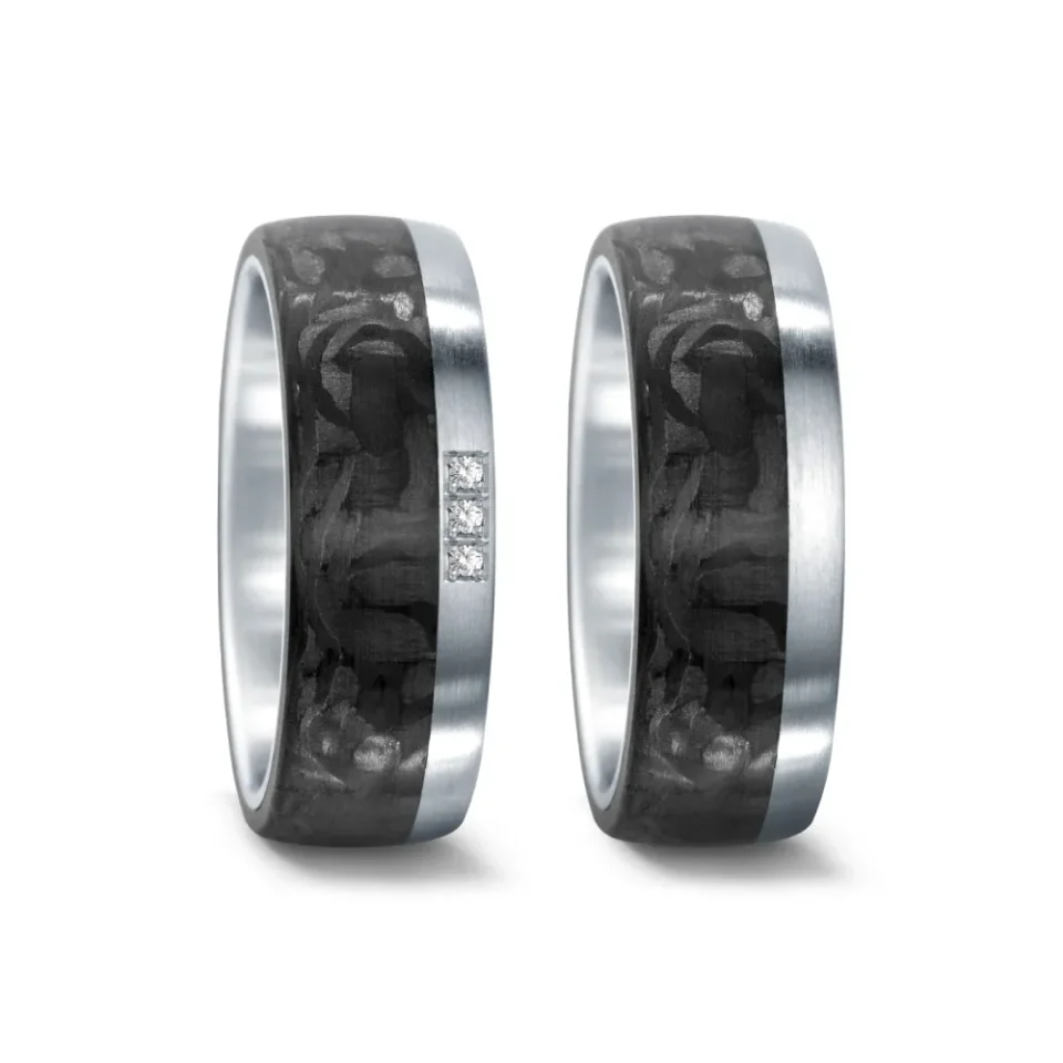 Alianzas de boda de acero y carbono con diamantes