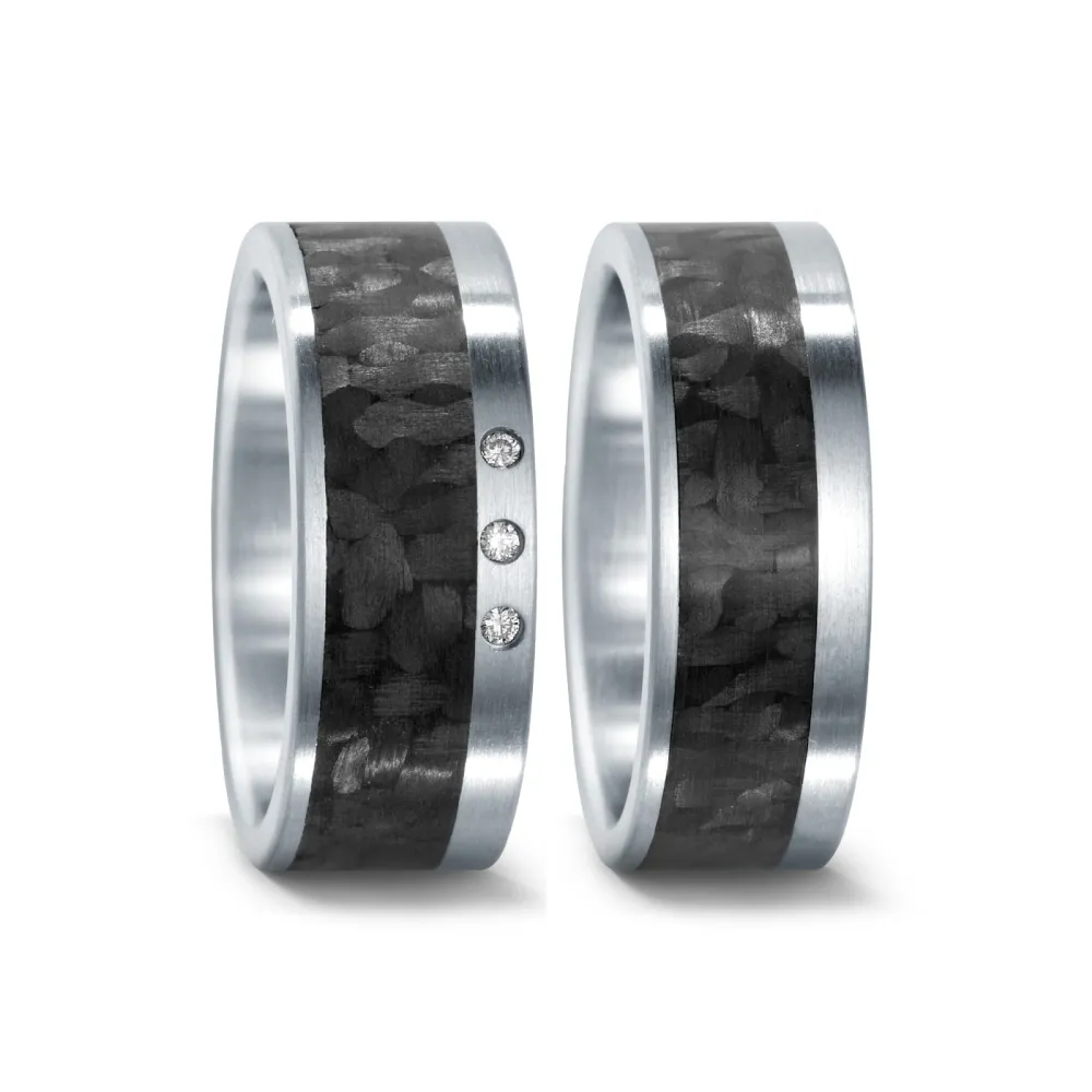 Alianzas de boda de acero y carbono con diamantes