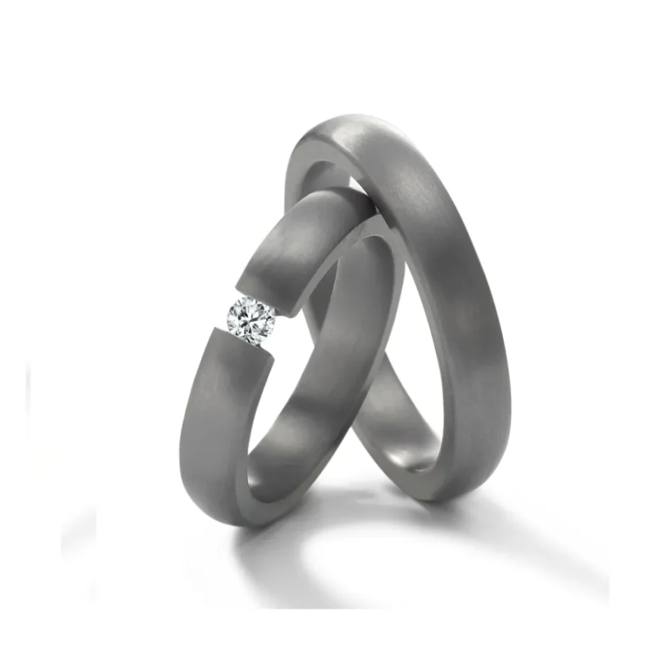 Alianzas de boda de tántalo con diamante