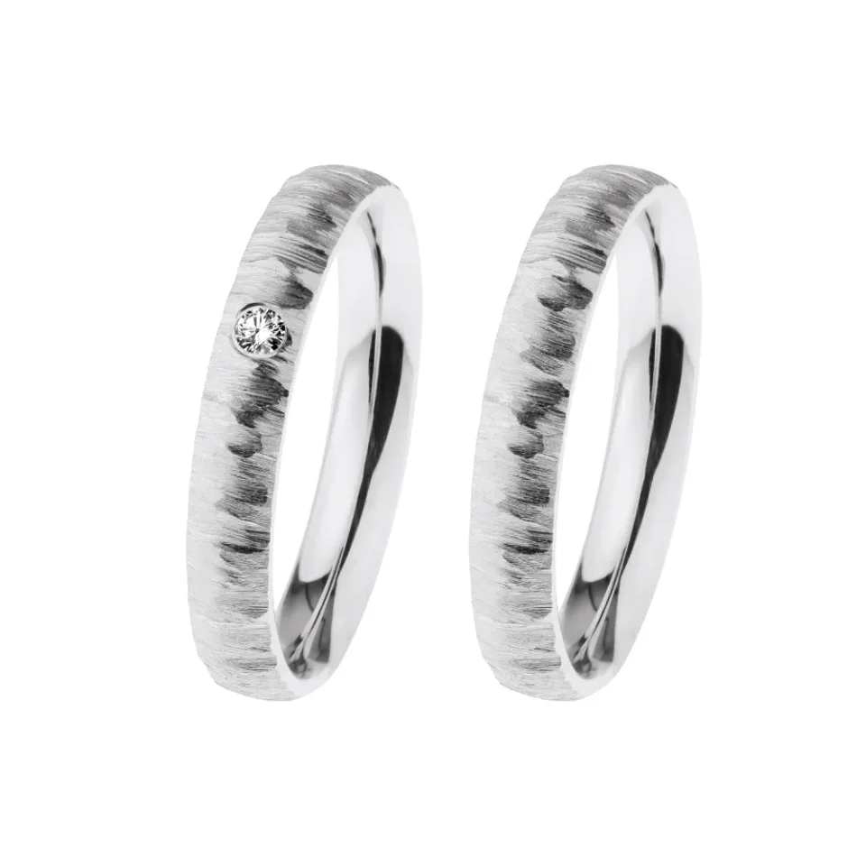 Alianzas de boda de acero con diamante