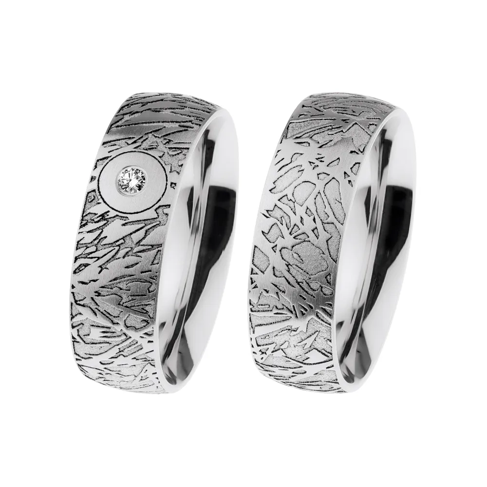 Alianzas de boda de acero con diamante