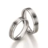 Alianzas de boda de acero y titanio con diamantes