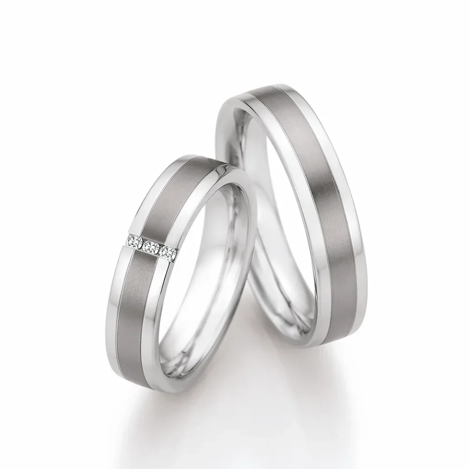 Alianzas de boda de acero y titanio con diamantes