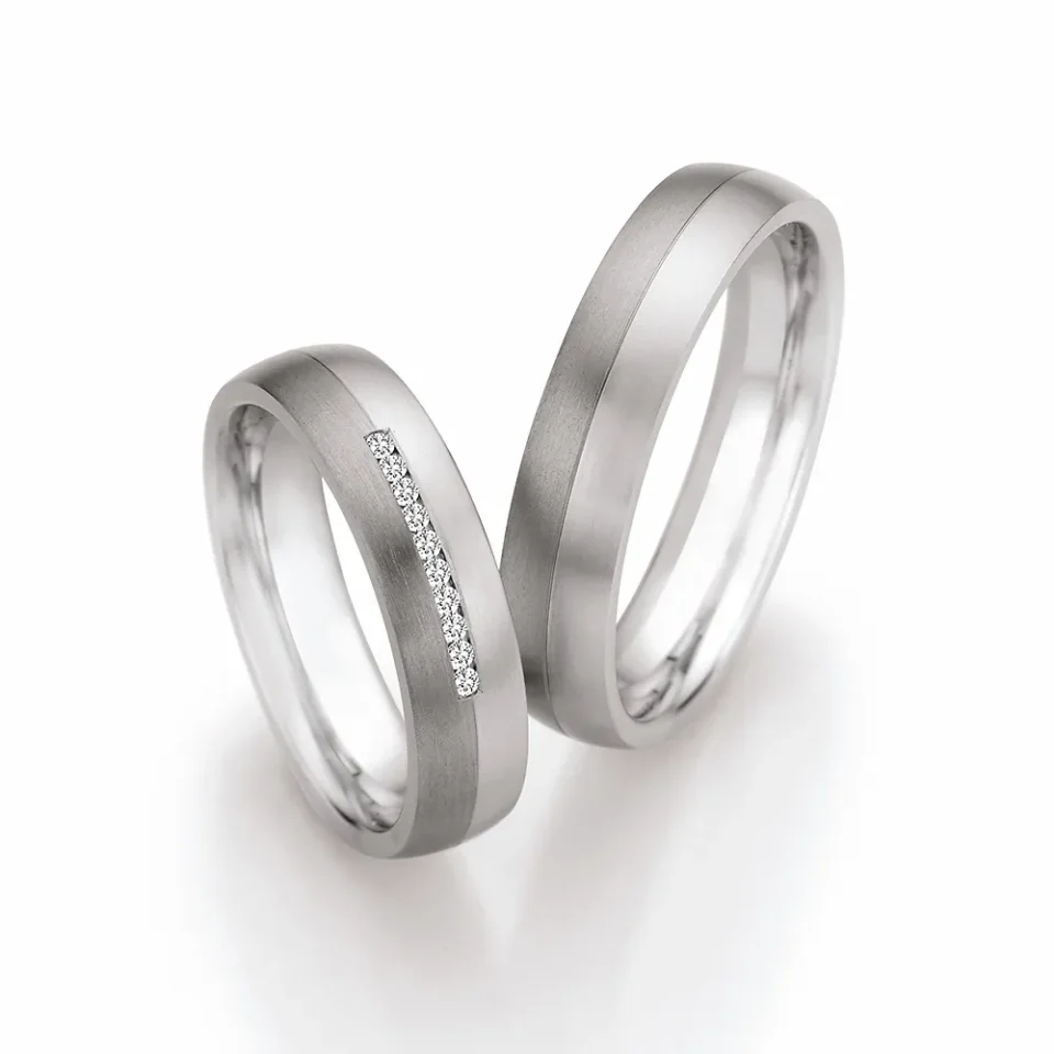 Alianzas de boda de acero y titanio con diamantes