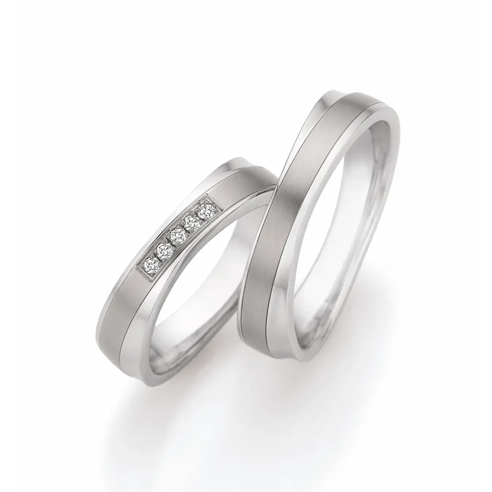 Alianzas de boda de acero y titanio con diamantes