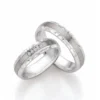 Alianzas de boda de acero y titanio con diamantes