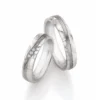 Alianzas de boda de acero y titanio con diamantes