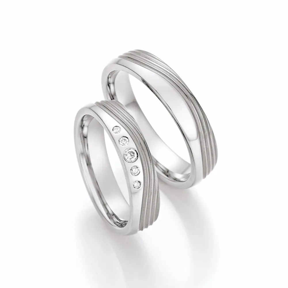 Alianzas de boda de titanio con diamantes