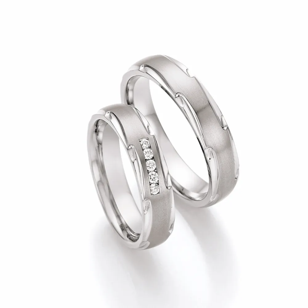 Alianzas de boda de titanio con diamantes