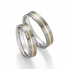 Alianzas de boda de titanio y oro amarillo con diamantes