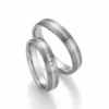 Alianzas de boda de titanio y oro blanco con diamantes
