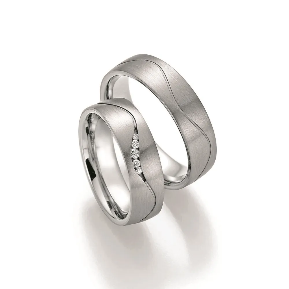 Alianzas de boda de titanio y platino con diamantes
