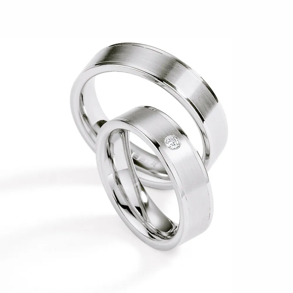Alianzas de boda de acero con diamante