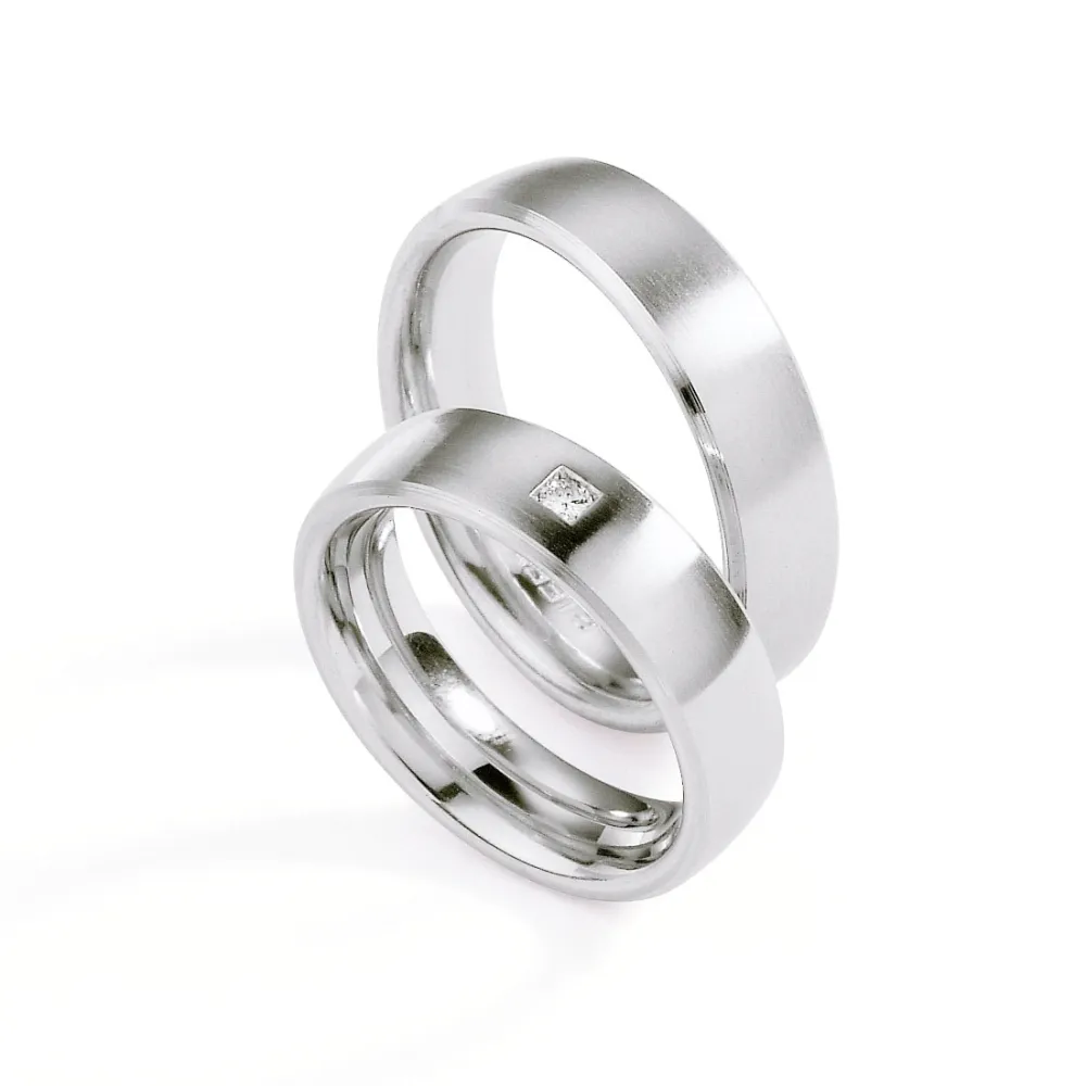 Alianzas de boda de acero con diamante