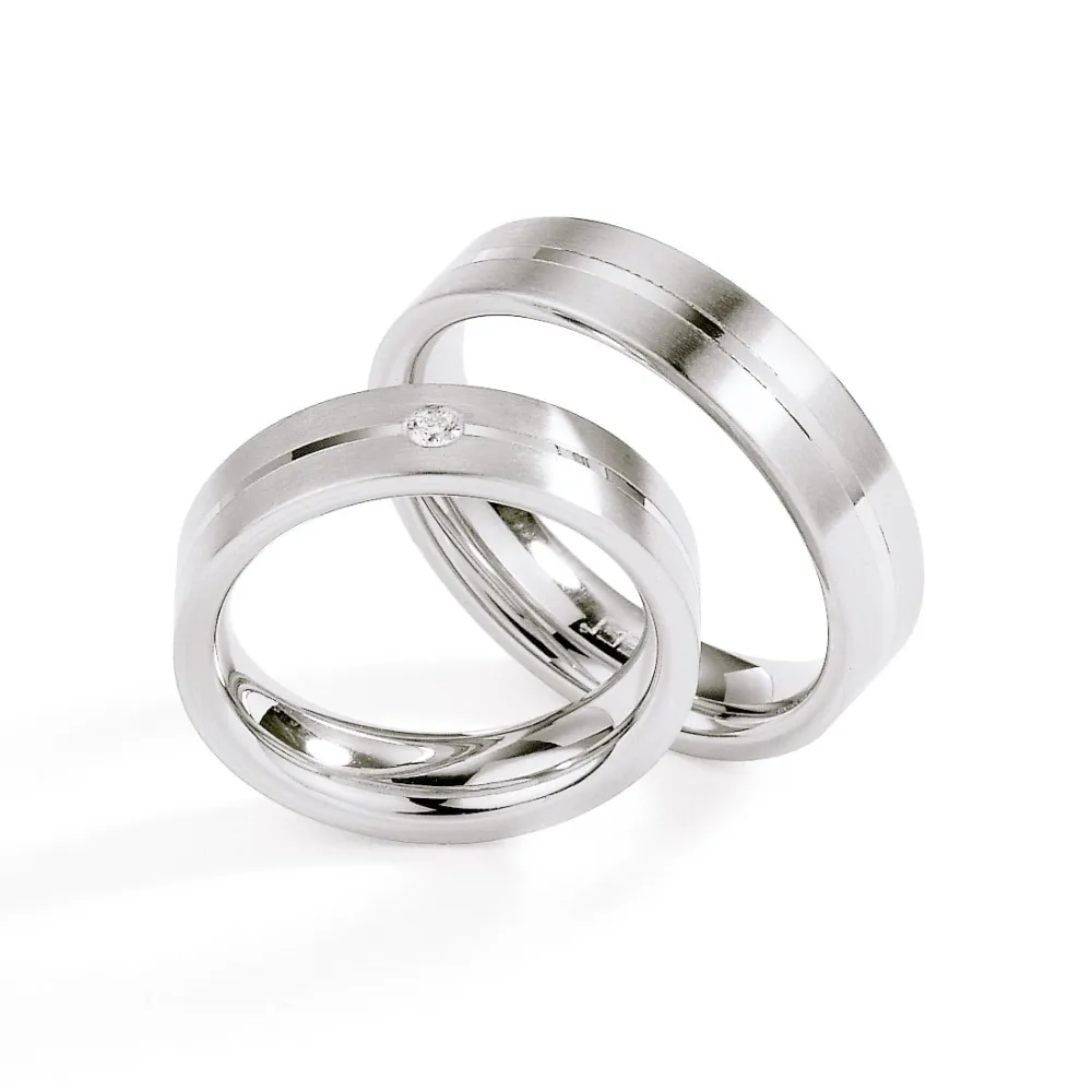 Alianzas de boda de acero con diamante