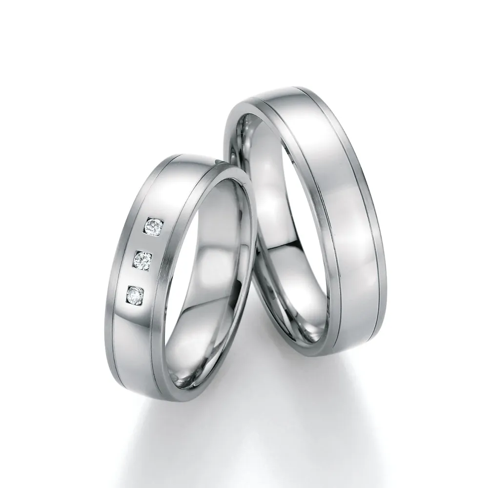 Alianzas de boda de acero con diamantes