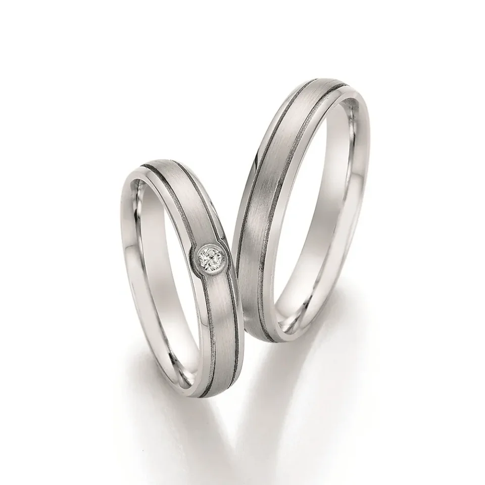 Alianzas de boda de acero con diamante
