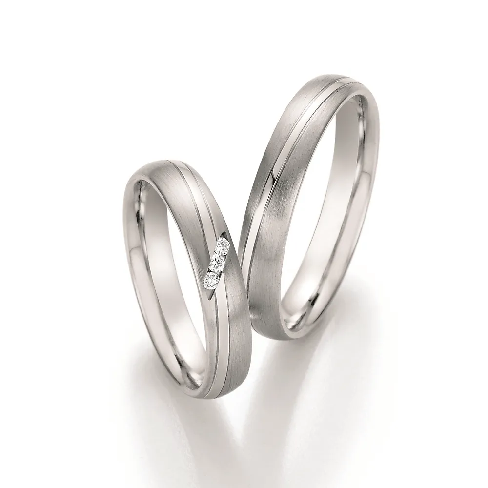 Alianzas de boda de acero con diamantes