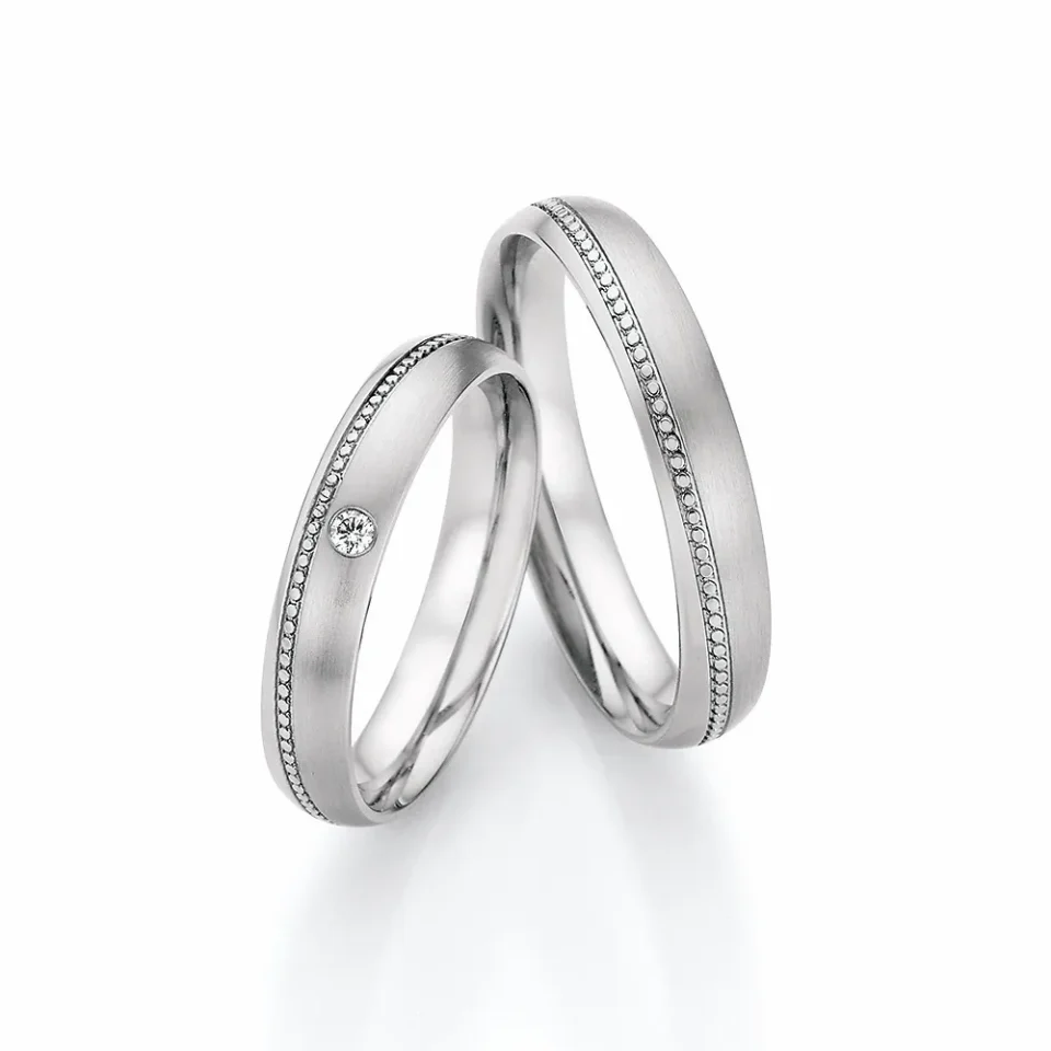 Alianzas de boda de acero con diamante