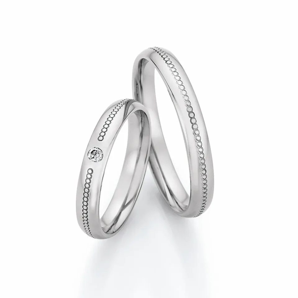 Alianzas de boda de acero con diamante