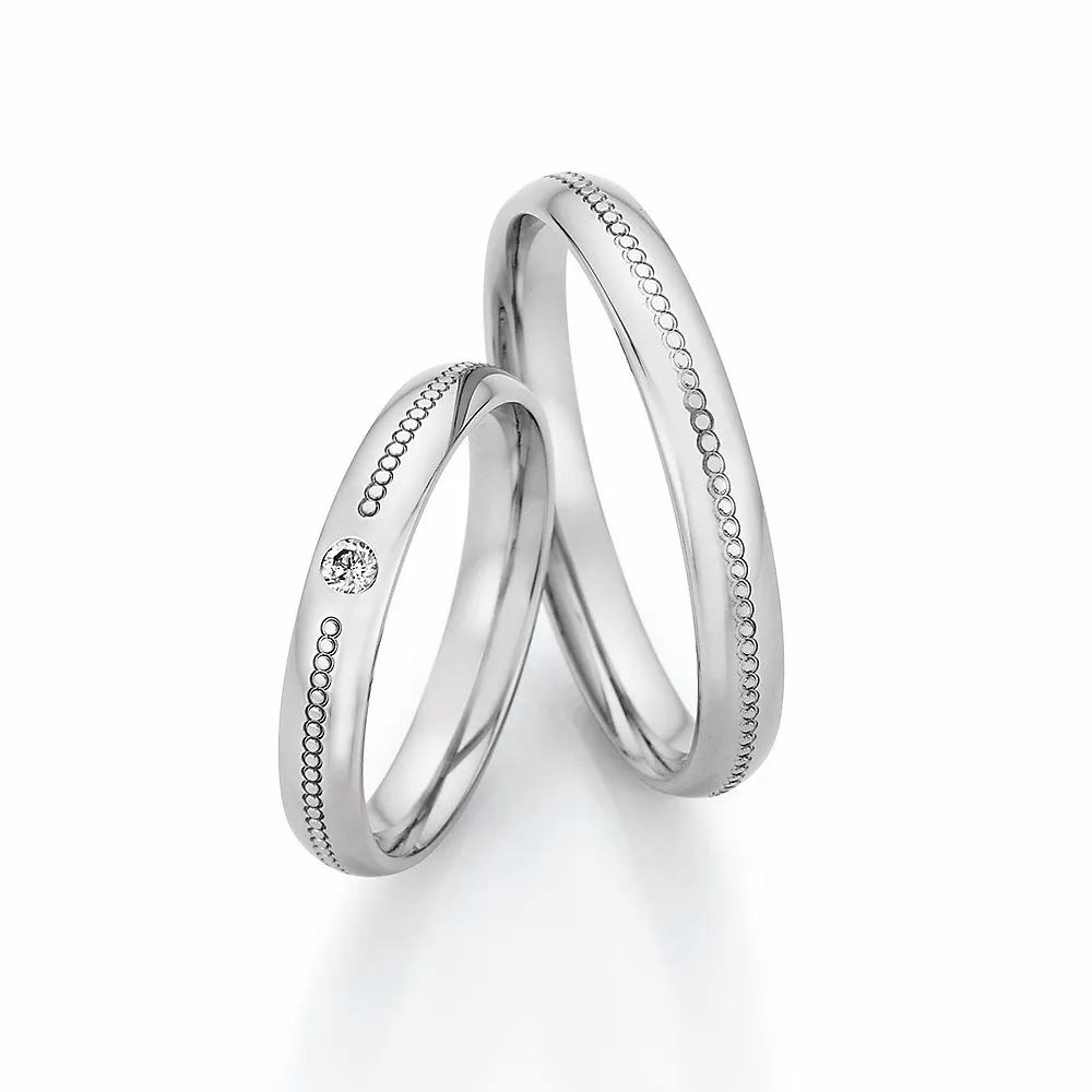 Alianzas de boda de acero con diamante
