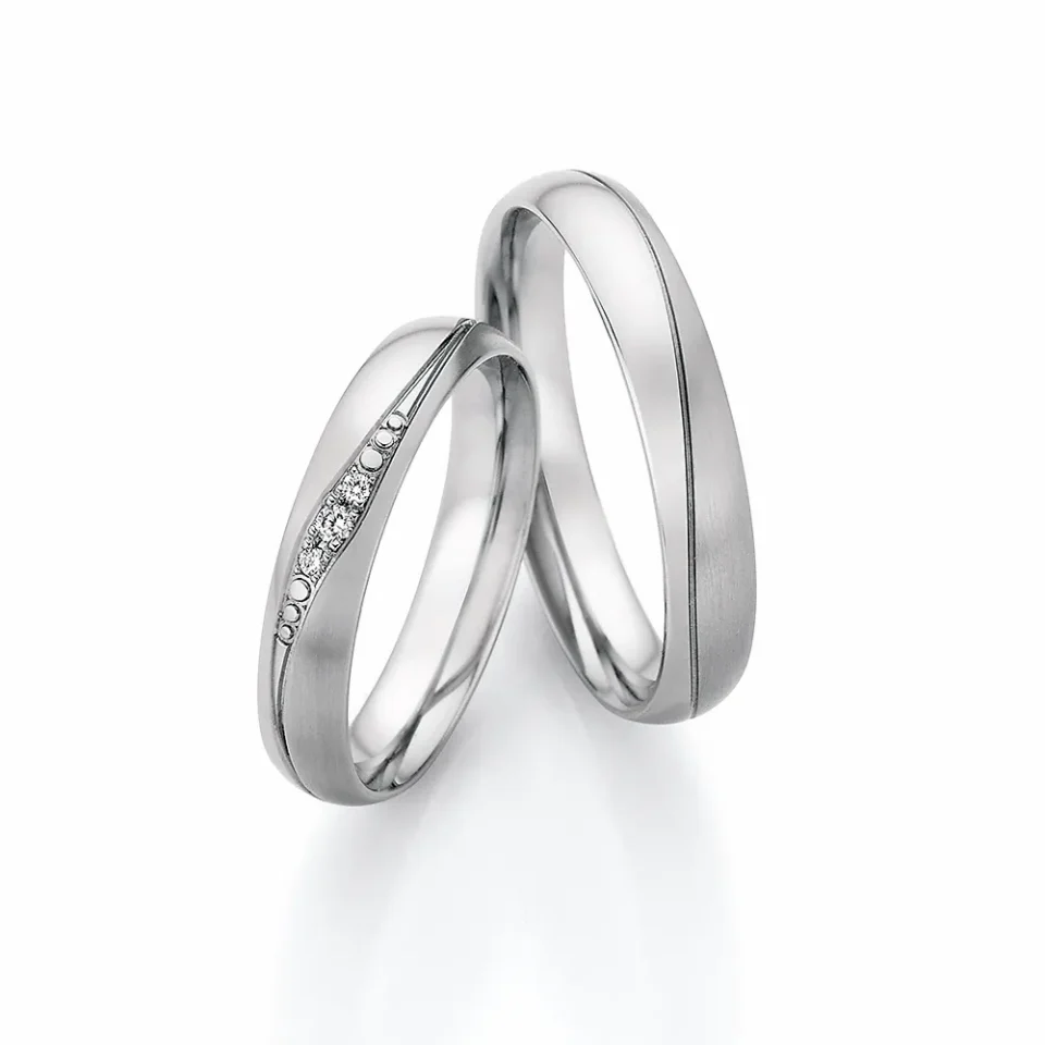 Alianzas de boda de acero con diamantes