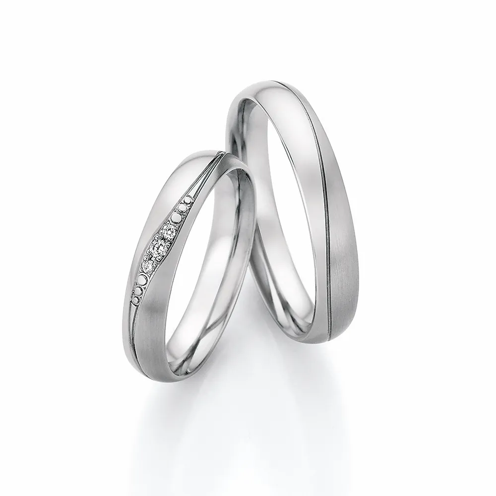 Alianzas de boda de acero con diamantes