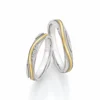 Alianzas de boda de acero y oro amarillo con diamantes