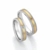 Alianzas de boda de acero y oro amarillo con diamante