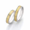 Alianzas de boda de acero y oro amarillo con diamante
