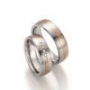 Alianzas de boda de acero y oro rosado con diamantes