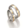 Alianzas de boda de acero y oro amarillo con diamante