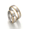 Alianzas de boda de acero y oro amarillo con diamantes