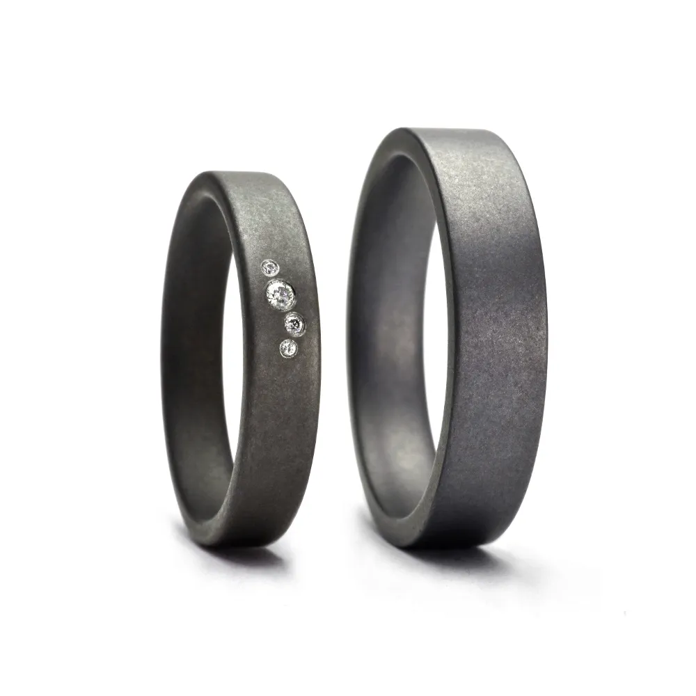Alianzas de boda de tántalo con diamantes
