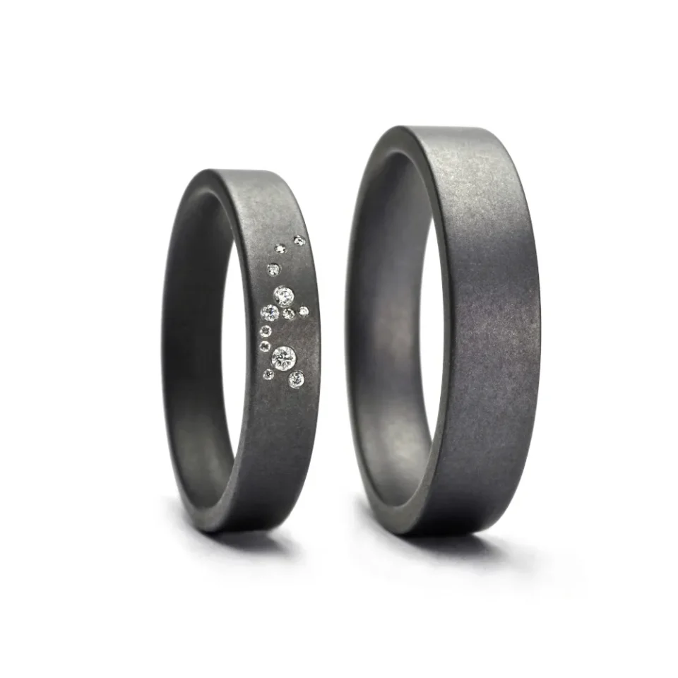 Alianzas de boda de tántalo con diamantes